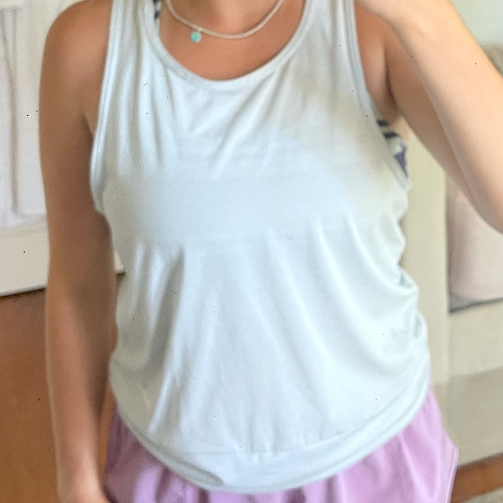NIKE light blue tank top with cut outs in back
